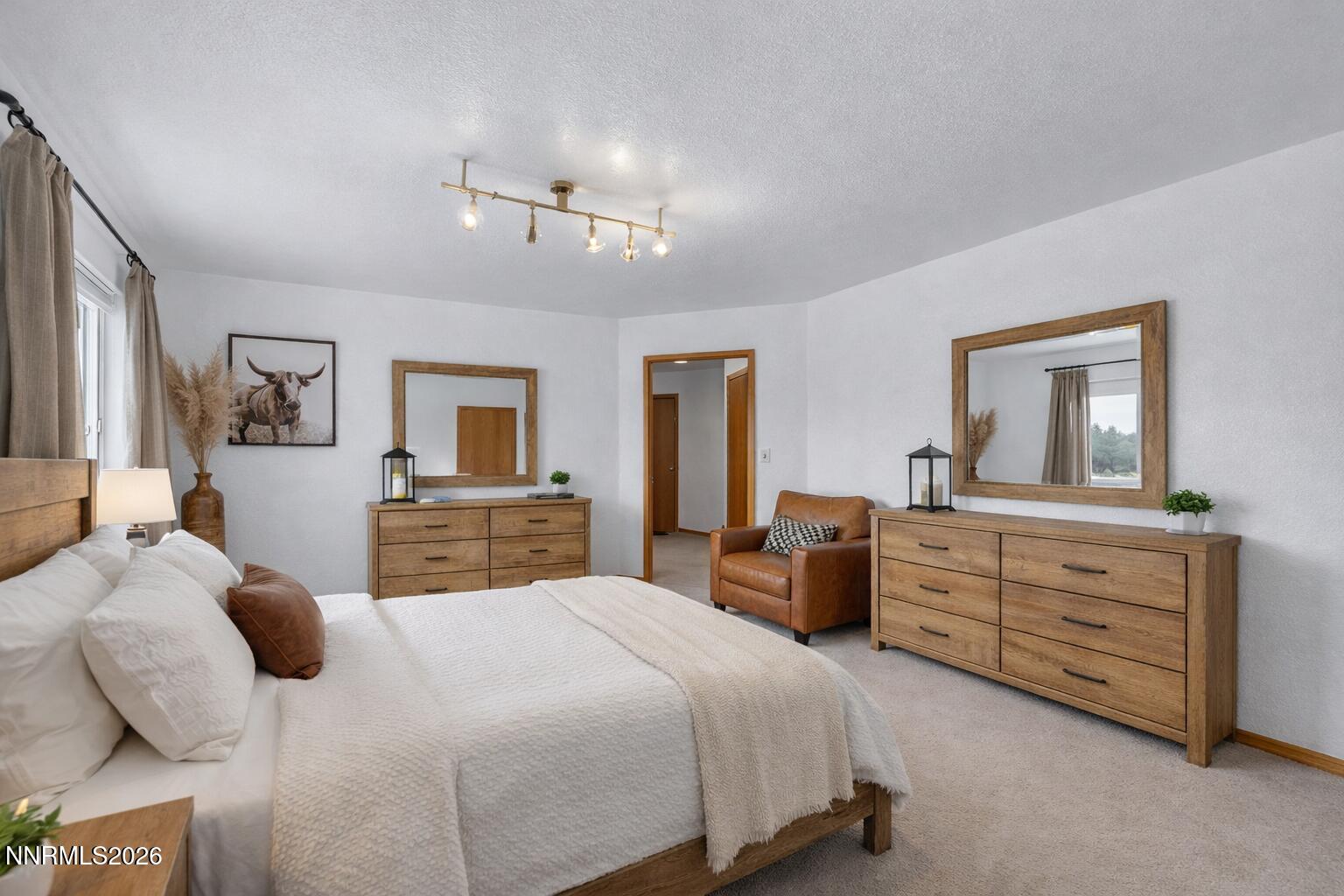 255 Shetland Circle Reno, NV 89508 - Photo 53 of 68 a bedroom with a bed and a dresser