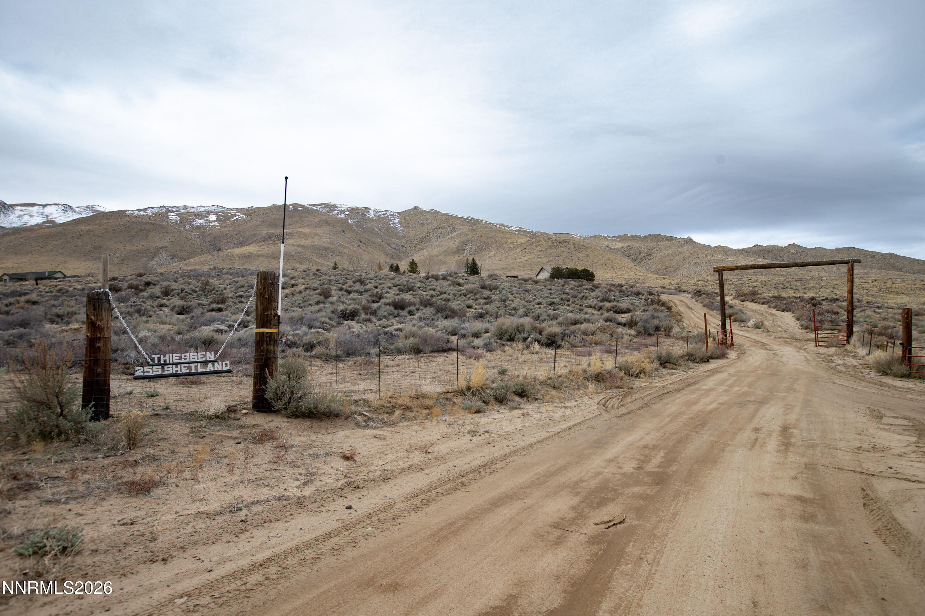 255 Shetland Circle Reno, NV 89508 - Photo 68 of 68 a view of a dry yard with a mountain view