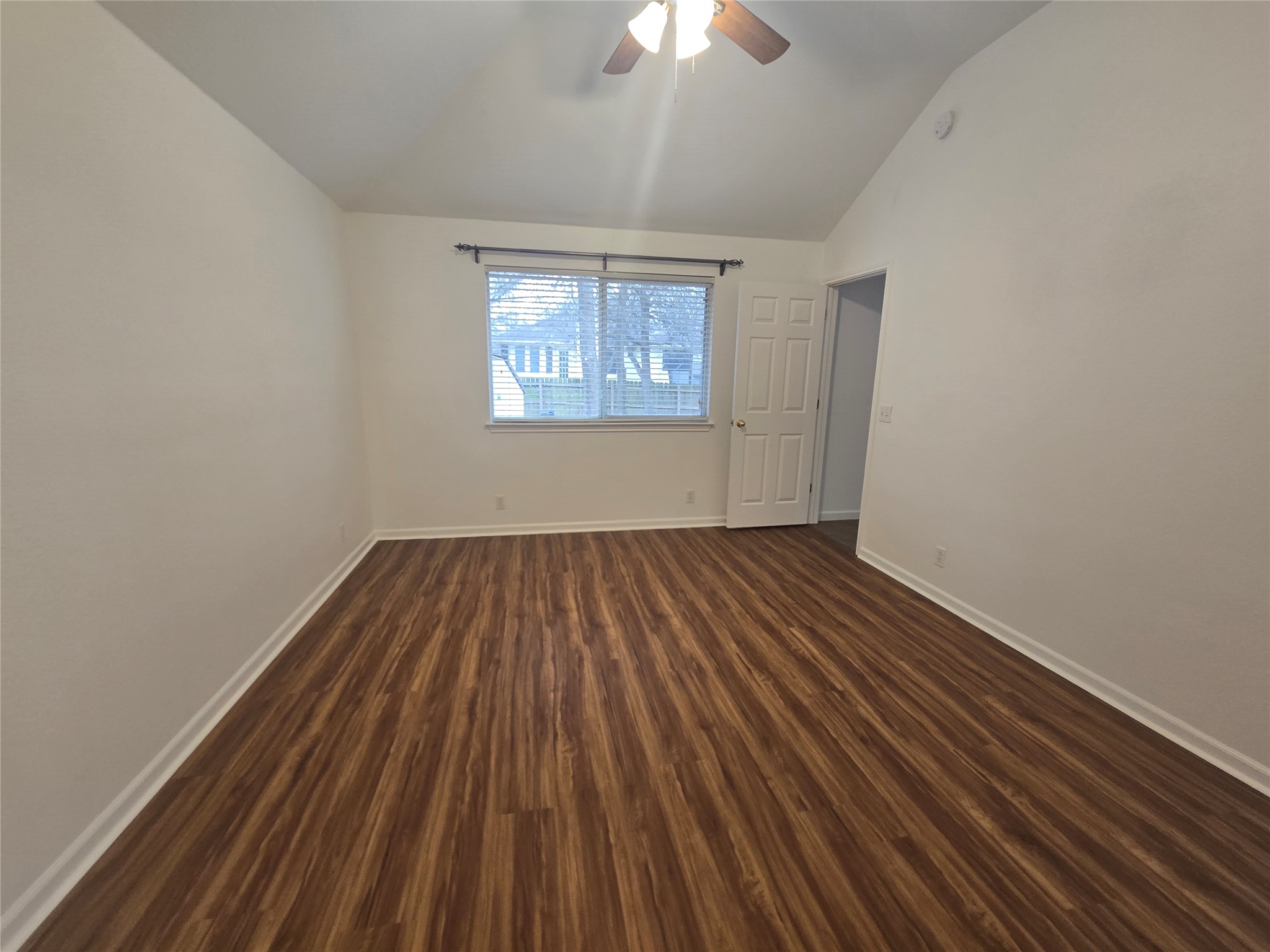 103 Hummingbird Court Cedar Creek, TX 78612 - Photo 17 of 24 a view of a room with wooden floor fan and window