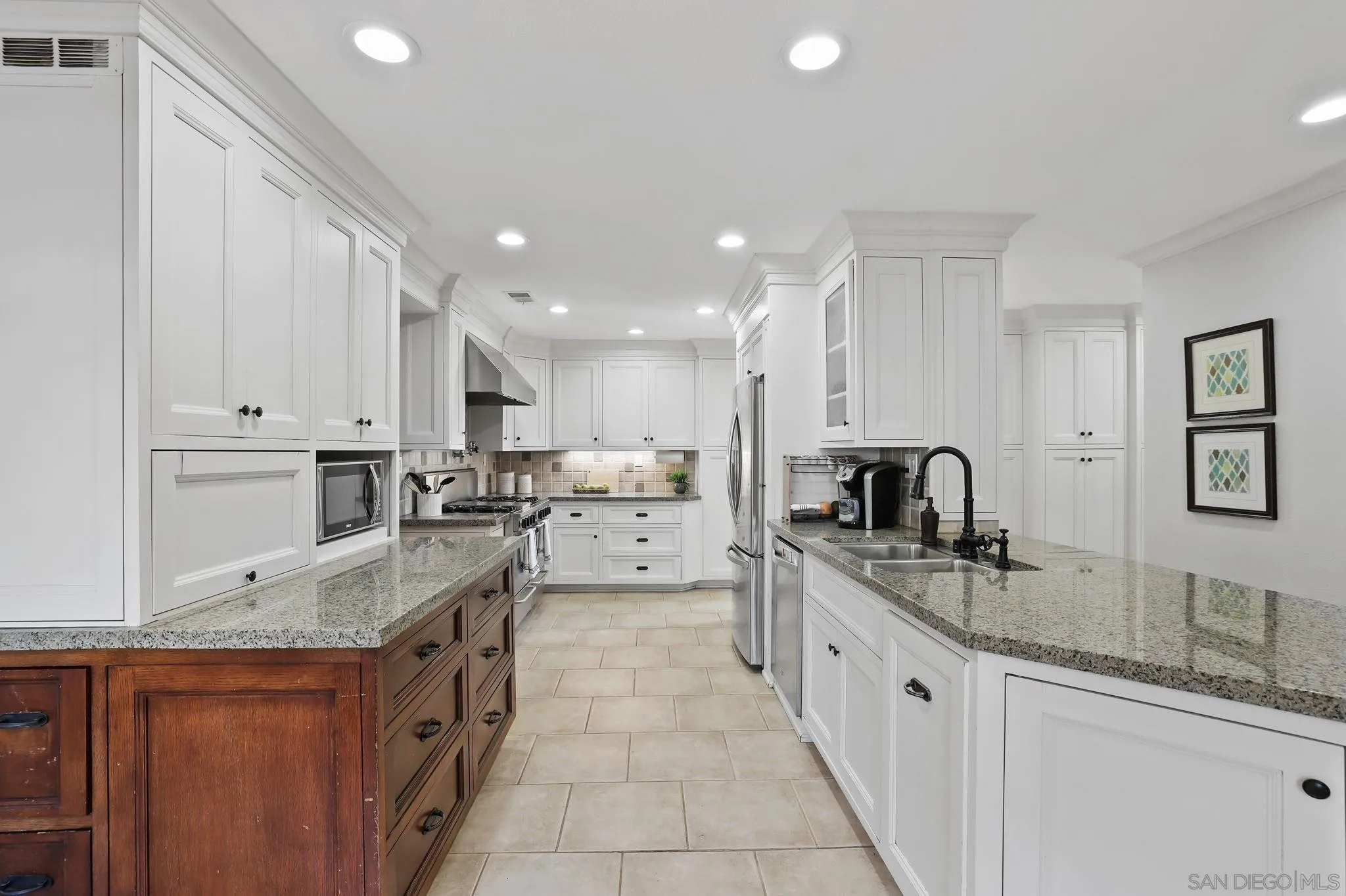 750 Jericho Drive Fallbrook, CA 92028 - Photo 11 of 69 a large kitchen with stainless steel appliances granite countertop a sink stove and cabinets
