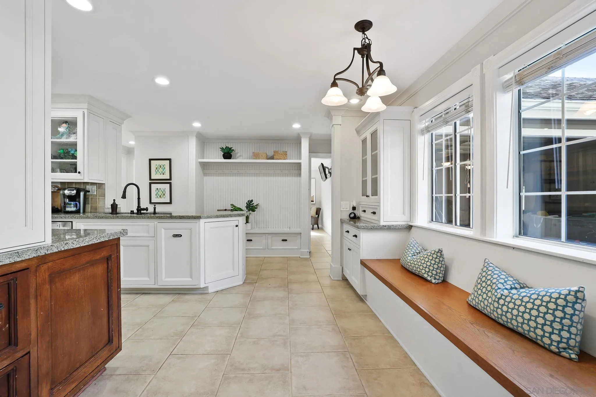 750 Jericho Drive Fallbrook, CA 92028 - Photo 15 of 69 a large kitchen with kitchen island stainless steel appliances a stove a sink a center island and furniture