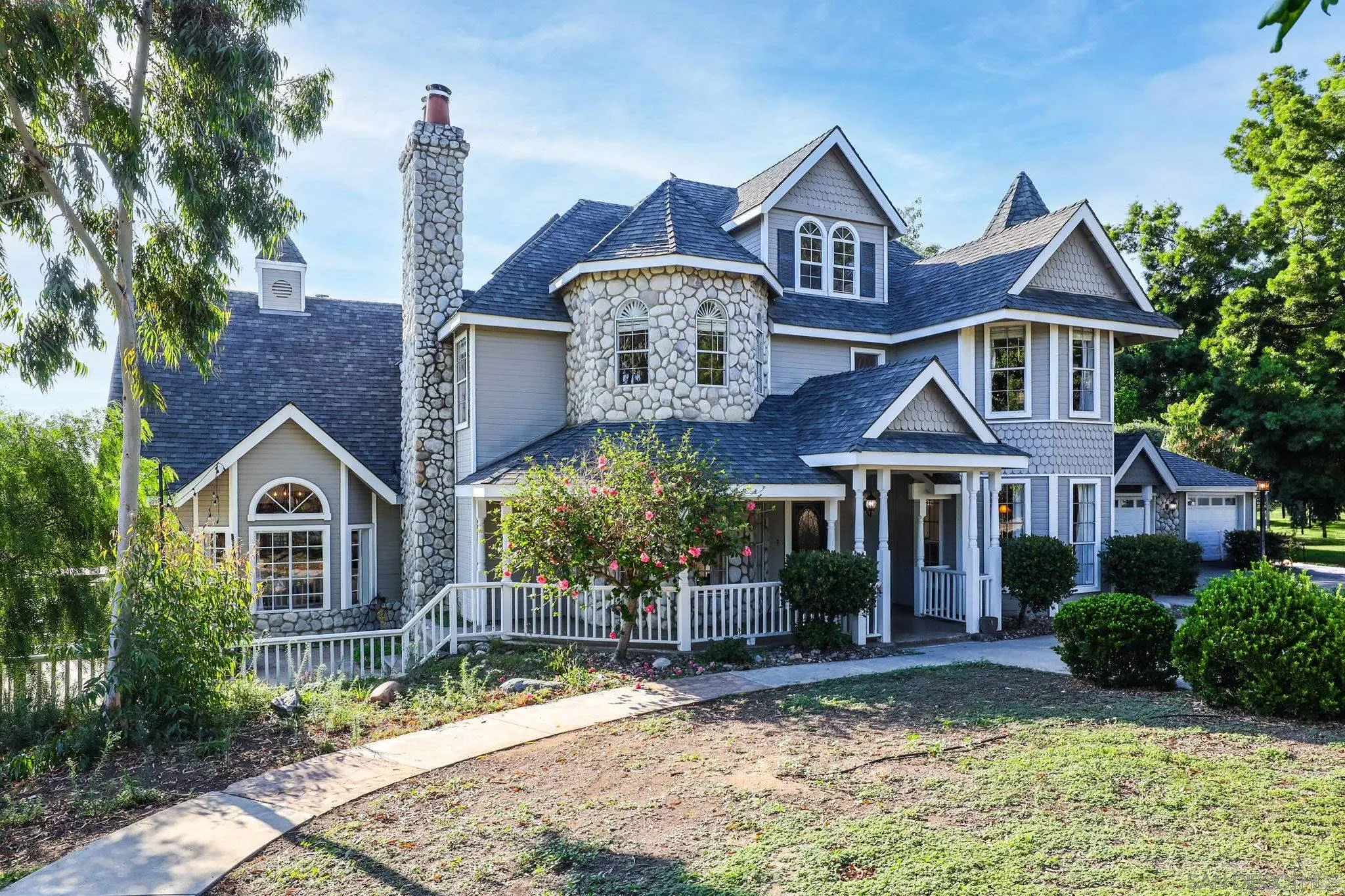 750 Jericho Drive Fallbrook, CA 92028 - Photo 2 of 69 a front view of a house with garden