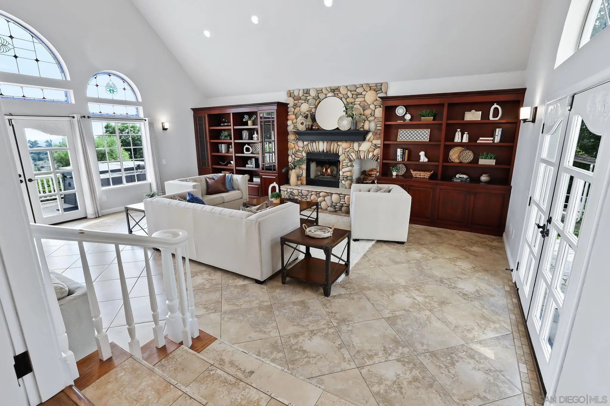 750 Jericho Drive Fallbrook, CA 92028 - Photo 23 of 69 a living room with furniture fireplace and large window