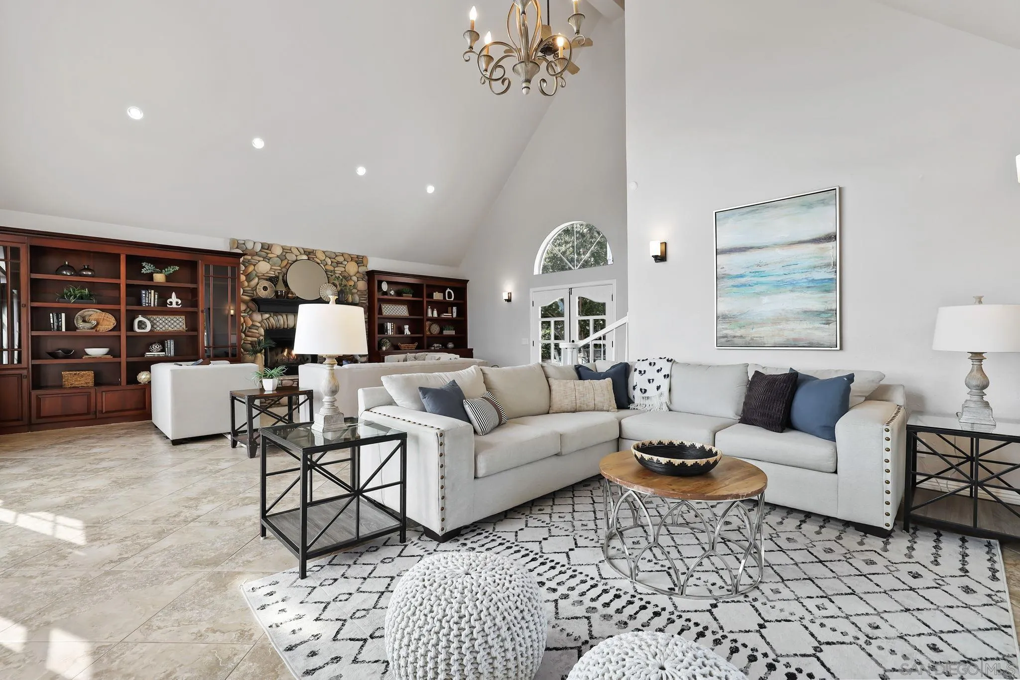 750 Jericho Drive Fallbrook, CA 92028 - Photo 27 of 69 a living room with furniture and a chandelier