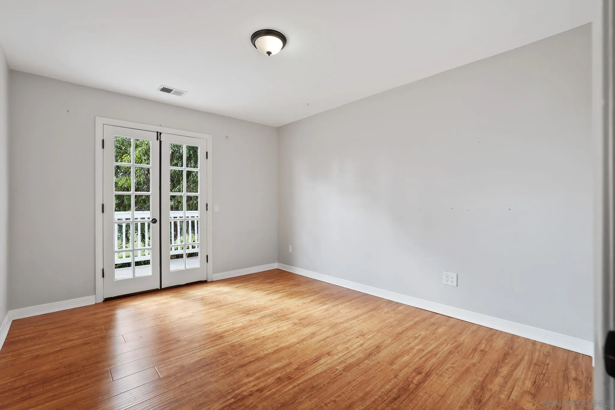 750 Jericho Drive Fallbrook, CA 92028 - Photo 34 of 69 wooden floor in an empty room with a window