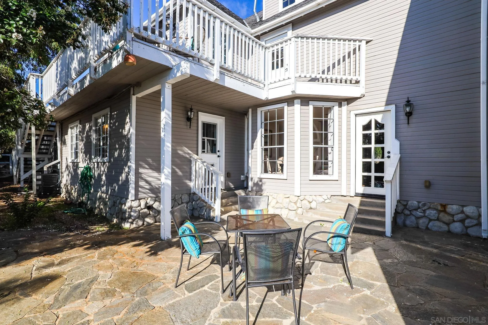 750 Jericho Drive Fallbrook, CA 92028 - Photo 46 of 69 a view of a cafe with a table and chairs in patio