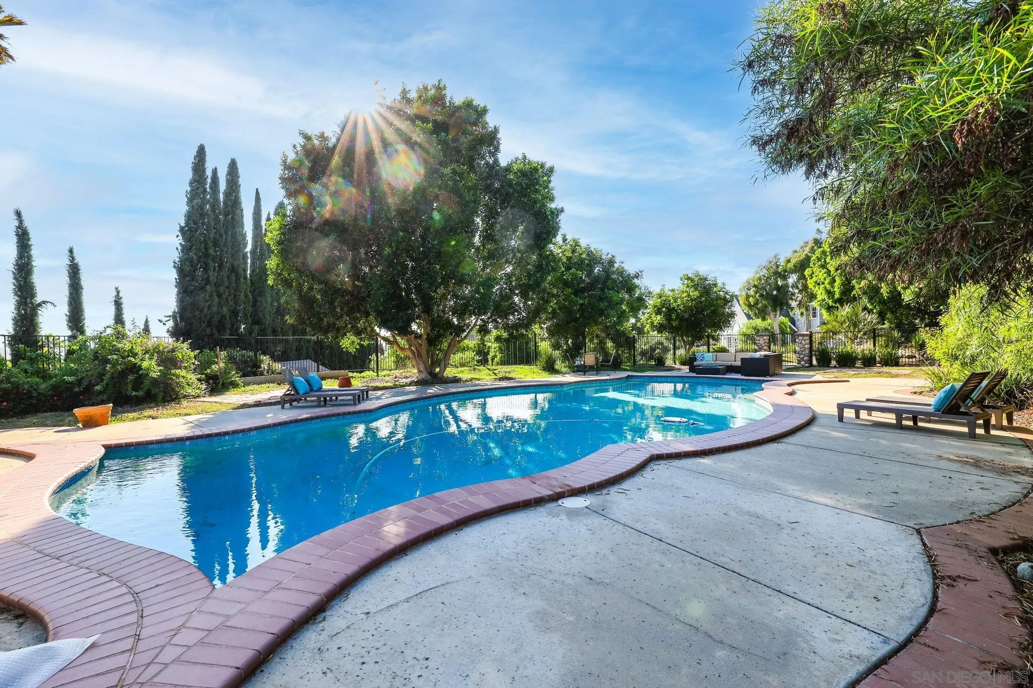 750 Jericho Drive Fallbrook, CA 92028 - Photo 61 of 69 a view of a swimming pool with a lounge chair