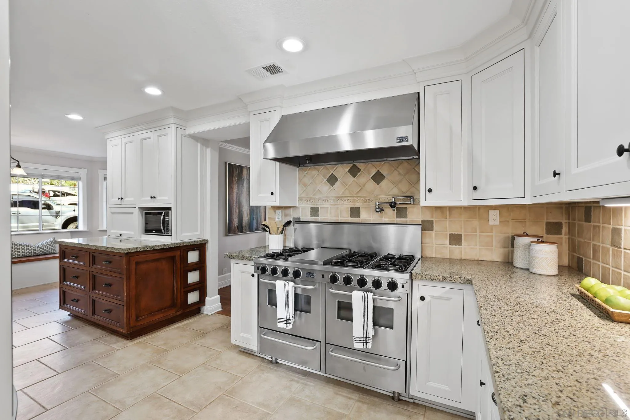750 Jericho Drive Fallbrook, CA 92028 - Photo 8 of 69 a kitchen with stainless steel appliances granite countertop a stove a sink and a refrigerator