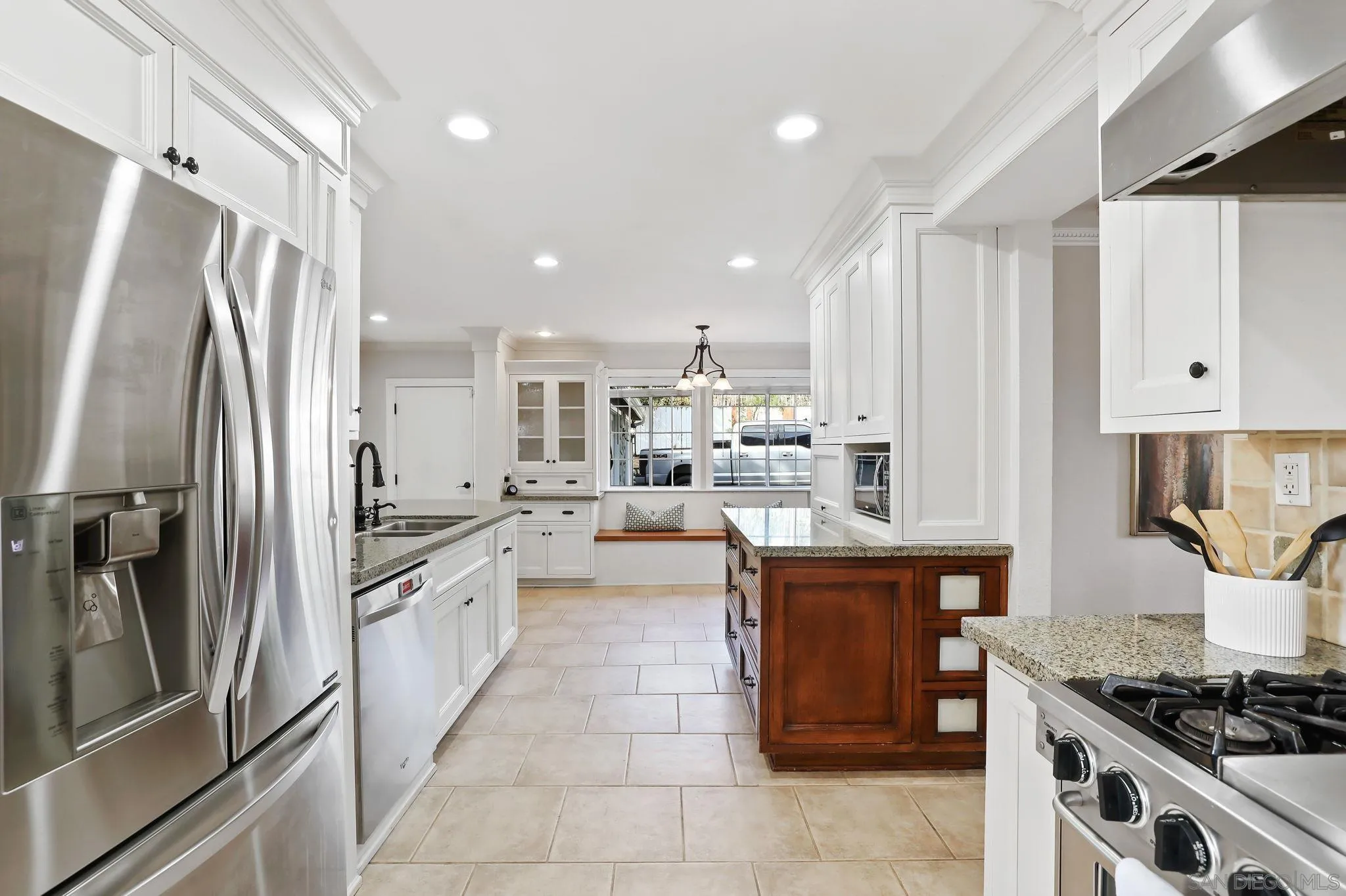 750 Jericho Drive Fallbrook, CA 92028 - Photo 10 of 69 a kitchen with stainless steel appliances granite countertop a refrigerator and a stove
