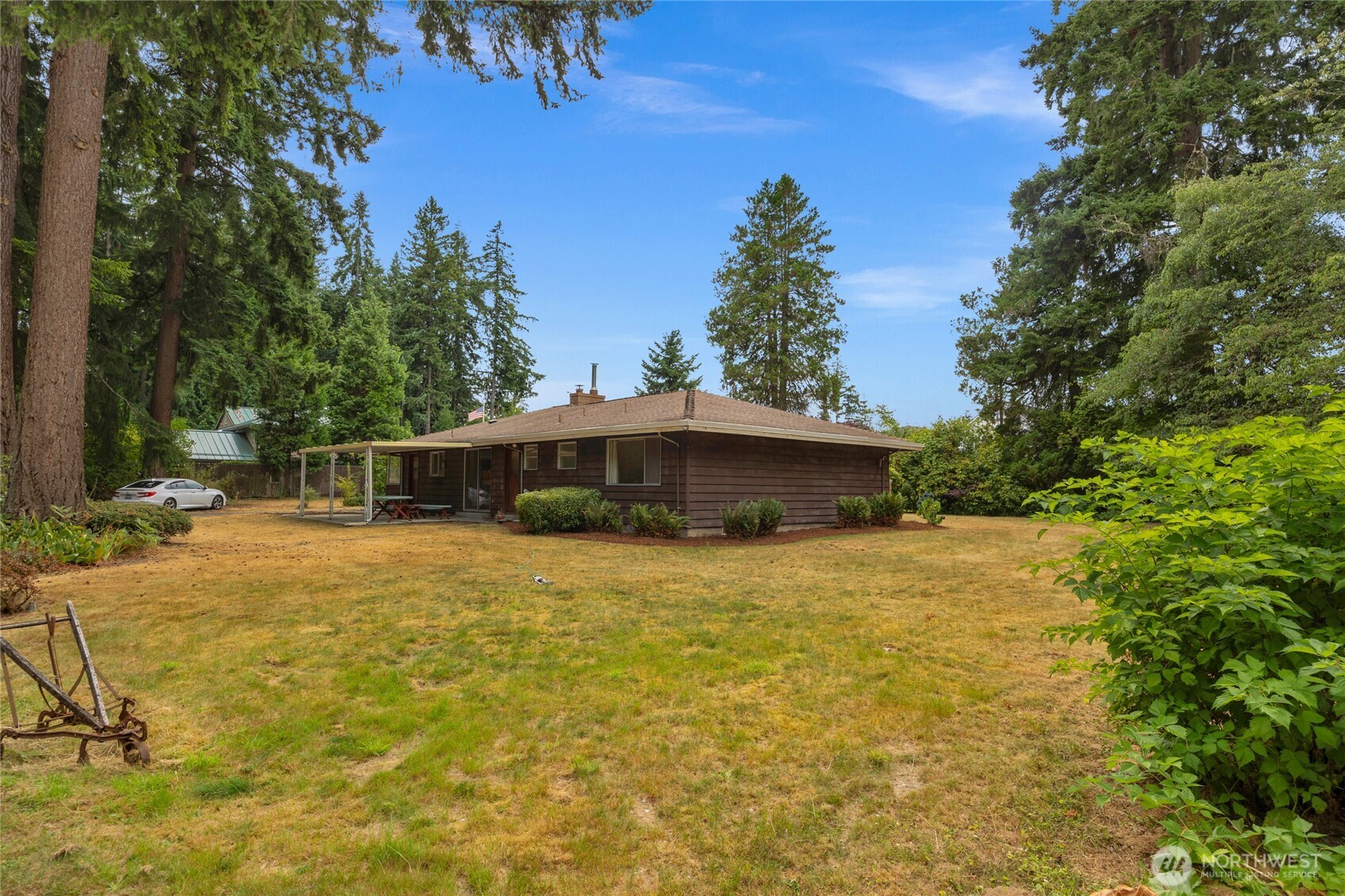 22221 45th Avenue Southeast Bothell, WA 98021 - Photo 20 of 32 a front view of a house with yard and trees