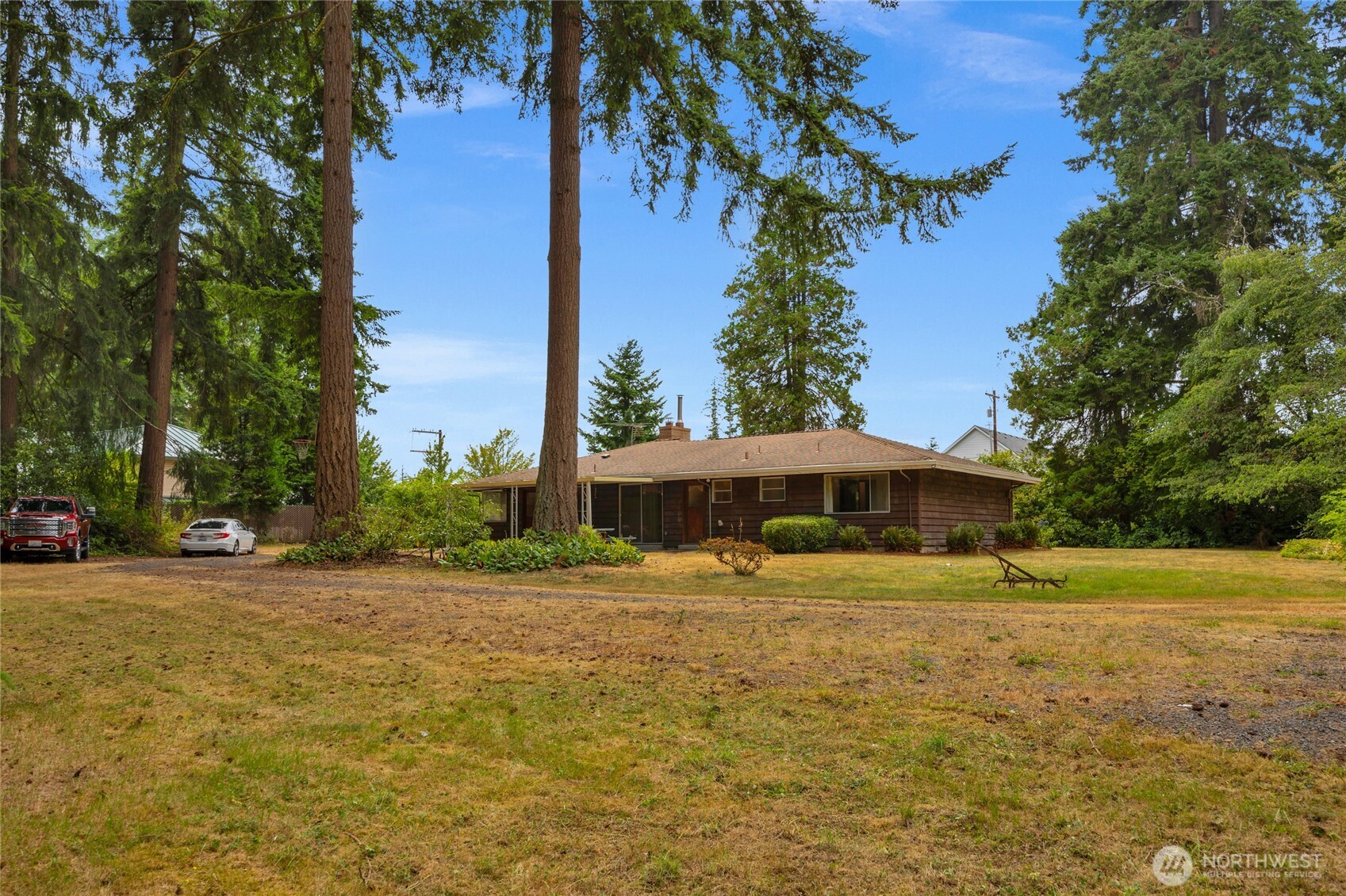 22221 45th Avenue Southeast Bothell, WA 98021 - Photo 24 of 32 a front view of a house with garden