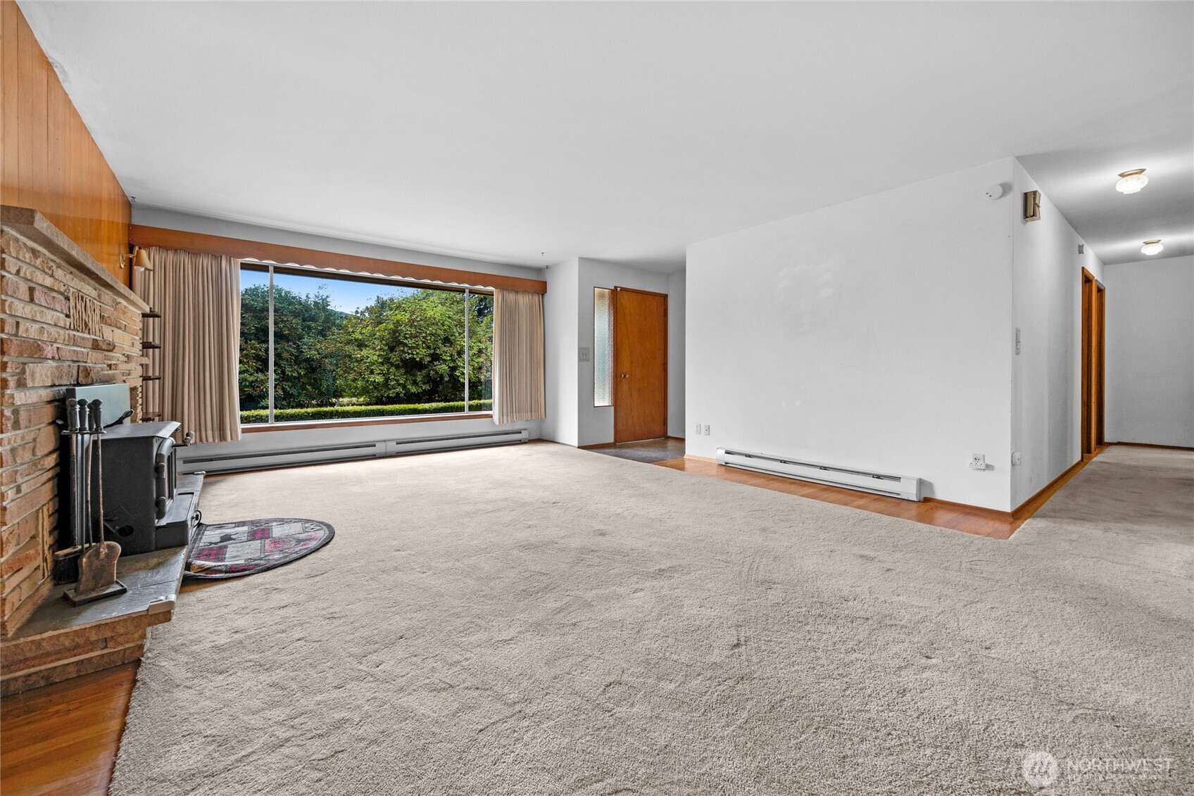 22221 45th Avenue Southeast Bothell, WA 98021 - Photo 3 of 32 a view of a livingroom with furniture and a window