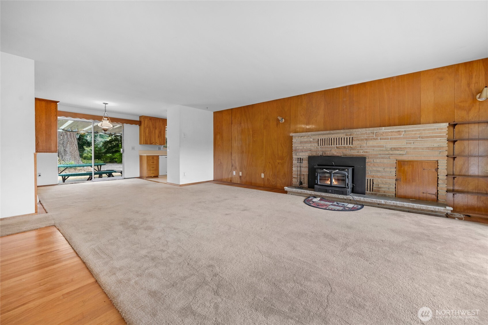 22221 45th Avenue Southeast Bothell, WA 98021 - Photo 6 of 32 an empty room with furniture and a fireplace