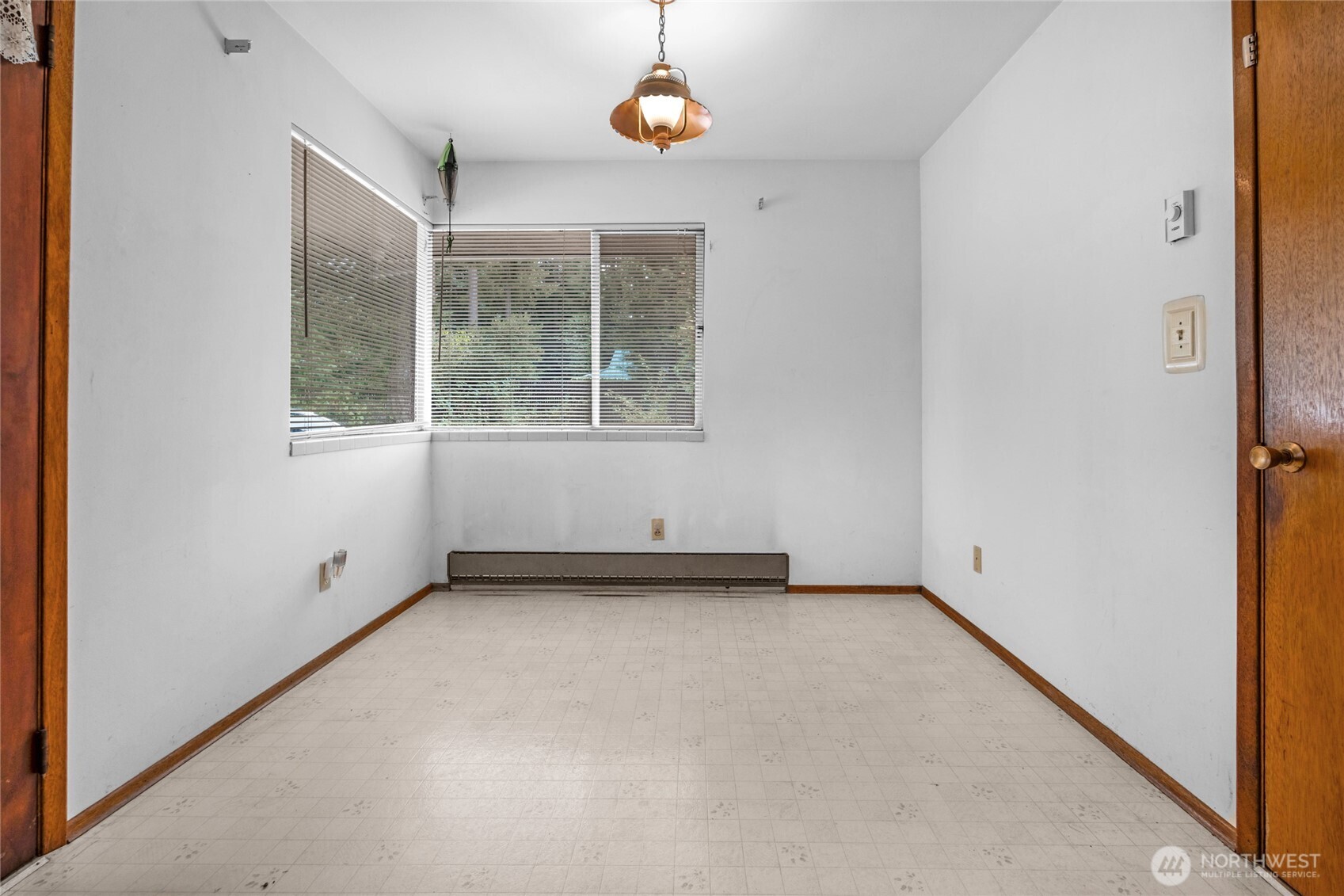 22221 45th Avenue Southeast Bothell, WA 98021 - Photo 10 of 32 an empty room with windows