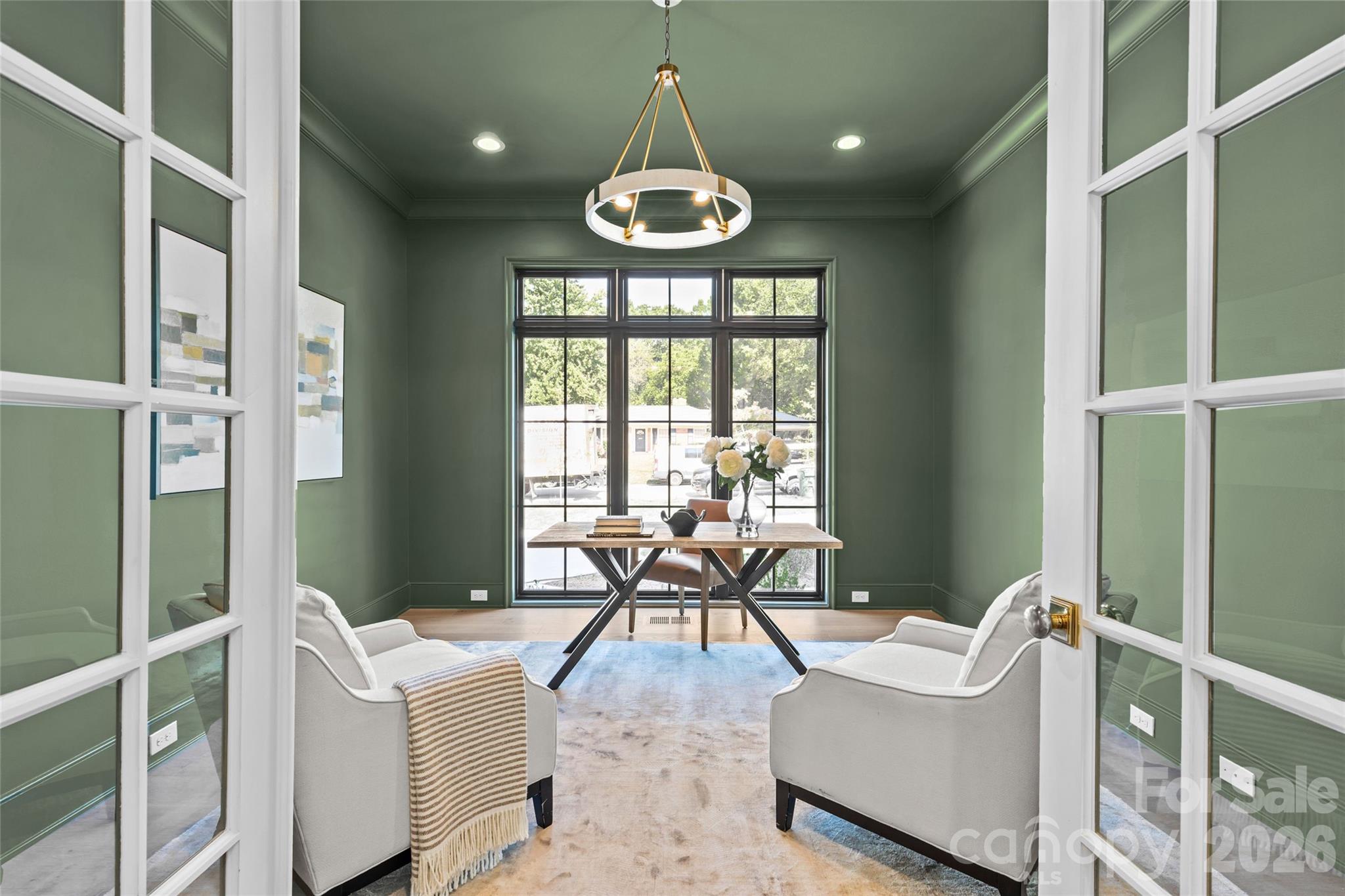 1321 Ferncliff Road Charlotte, NC 28211 - Photo 17 of 47 a living room with furniture and a large window
