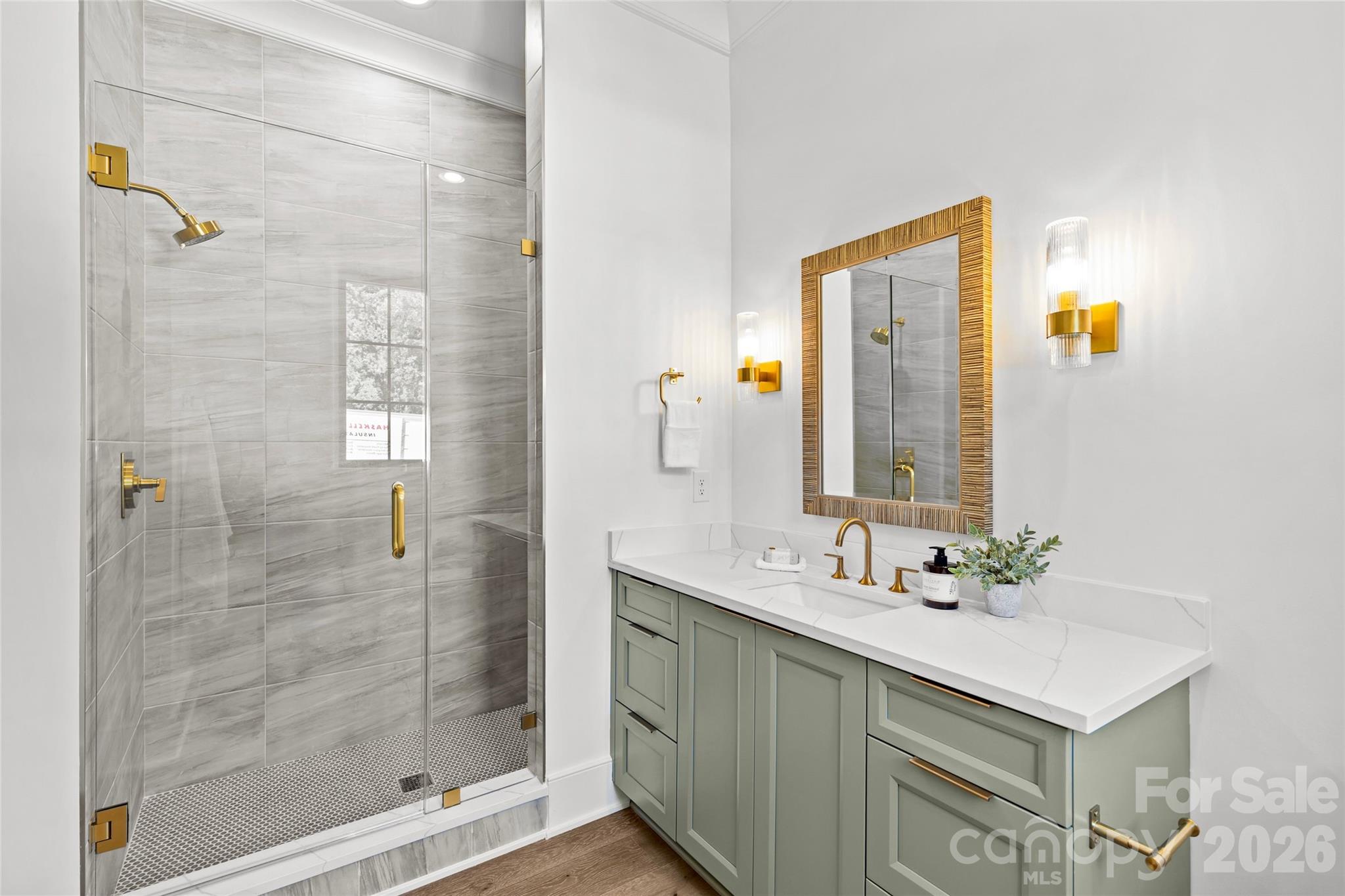 1321 Ferncliff Road Charlotte, NC 28211 - Photo 18 of 47 a bathroom with a sink and a mirror