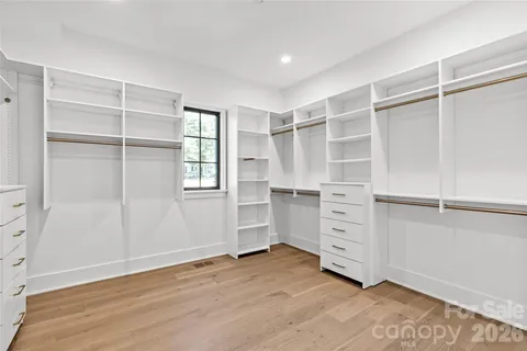 a view of an empty walk in closet