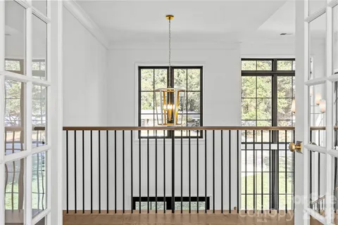 a view of empty room with windows