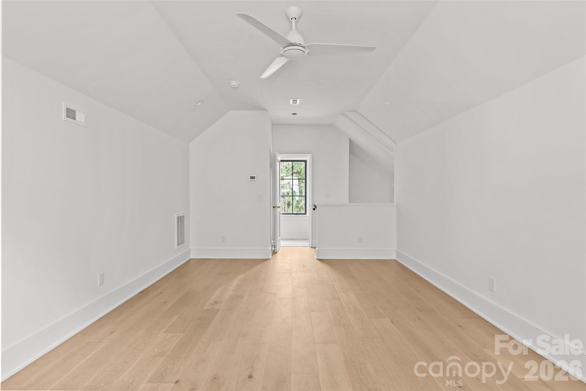 1321 Ferncliff Road Charlotte, NC 28211 - Photo 43 of 47 an empty room with windows and cabinet