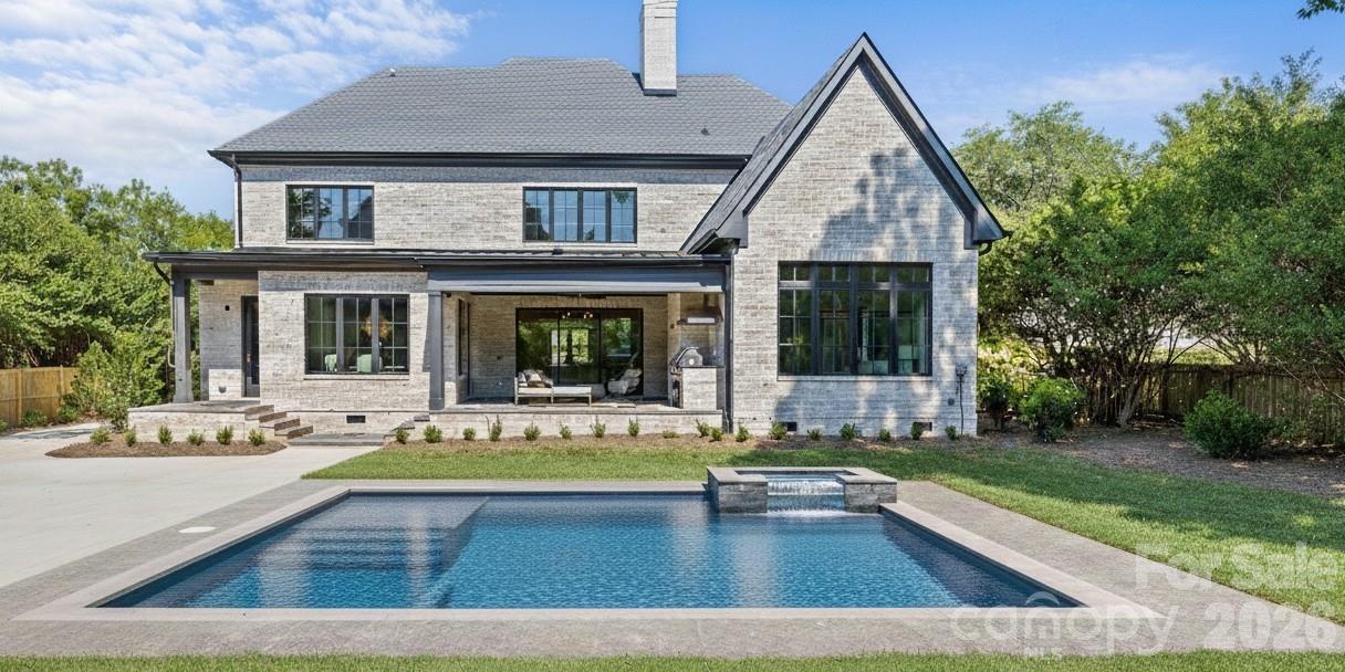 1321 Ferncliff Road Charlotte, NC 28211 - Photo 6 of 47 a view of house with yard swimming pool and outdoor seating