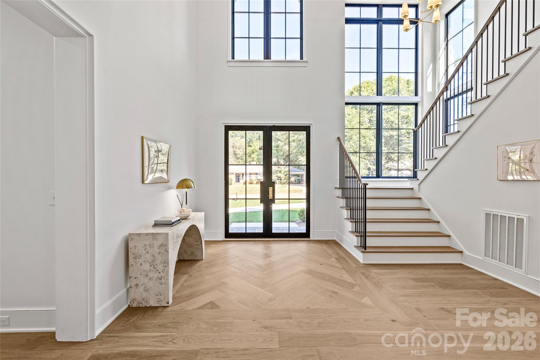 1321 Ferncliff Road Charlotte, NC 28211 - Photo 9 of 47 a view of entryway and hall with wooden floor
