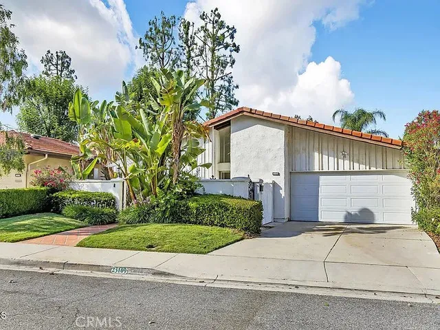 a house view with a outdoor space