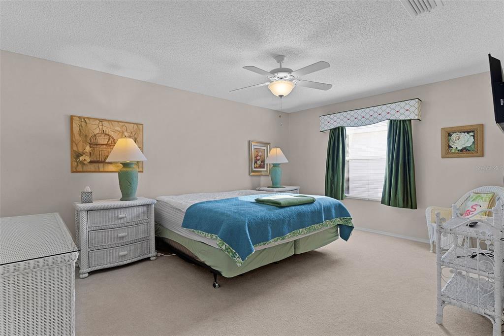 2623 Ascot Loop The Villages, FL 32162 - Photo 17 of 40 a bedroom with a bed and a window