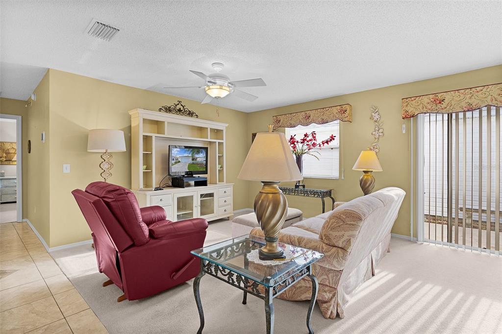 2623 Ascot Loop The Villages, FL 32162 - Photo 5 of 40 a living room with furniture and a large window