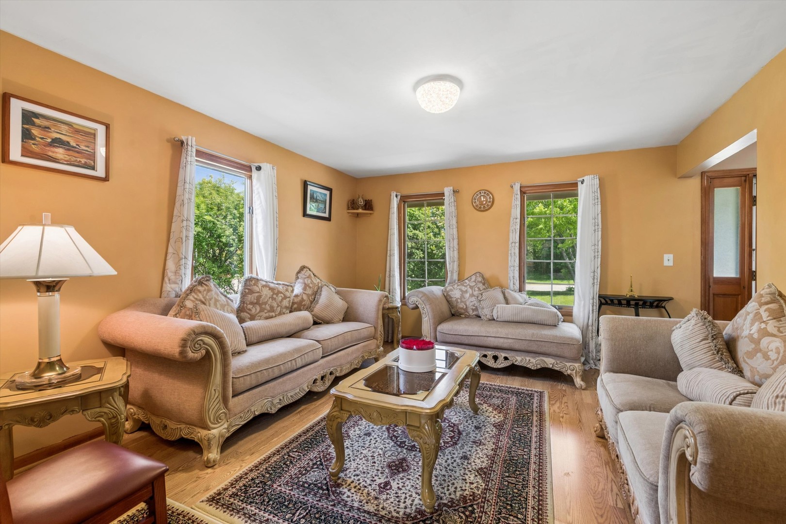 2142 North Summit Street Wheaton, IL 60187 - Photo 7 of 35 a living room with furniture and a large window
