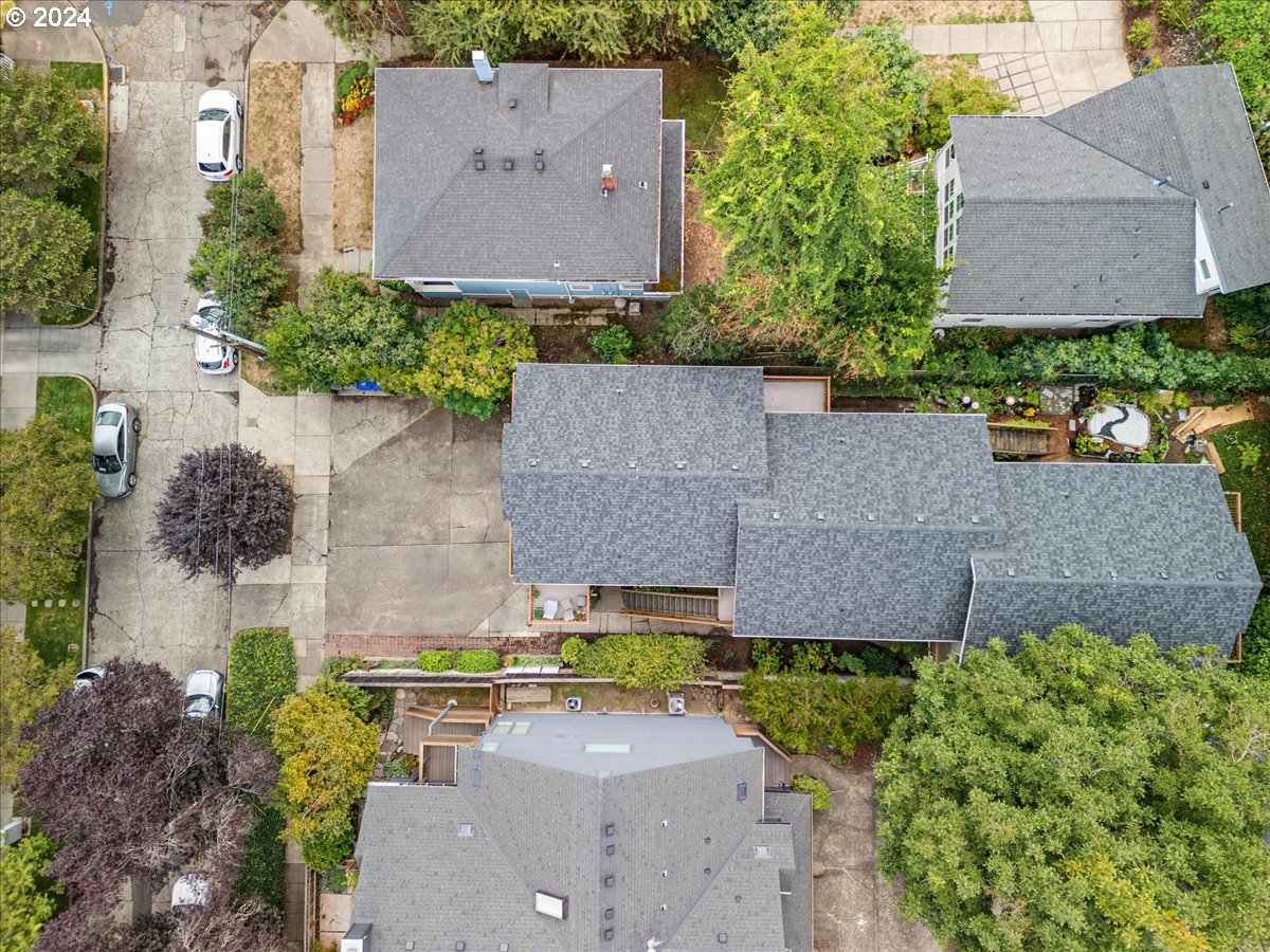 5221 Southwest View Point Terrace, Unit 2 Portland, OR 97239 - Photo 23 of 30 an aerial view of a house with a garden and yard