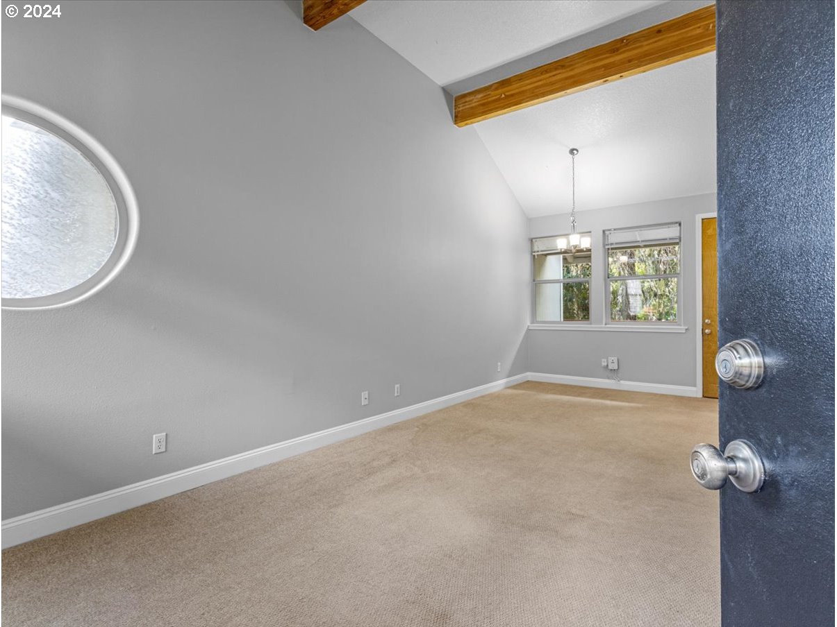 5221 Southwest View Point Terrace, Unit 2 Portland, OR 97239 - Photo 5 of 30 a view of an empty room with a window