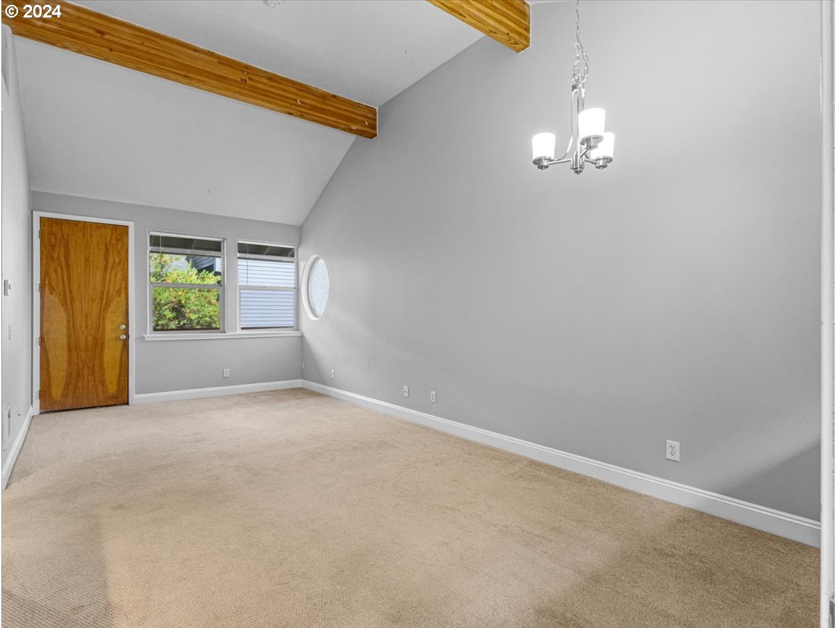 5221 Southwest View Point Terrace, Unit 2 Portland, OR 97239 - Photo 8 of 30 en empty room with windows