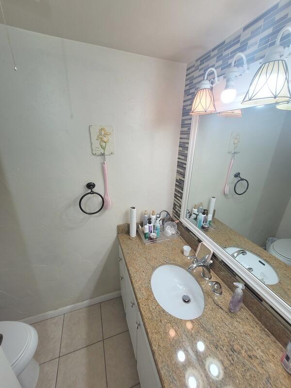 320 Pine Ridge Circle, Unit A1 Greenacres, FL 33463 - Photo 14 of 65 20220403_132747