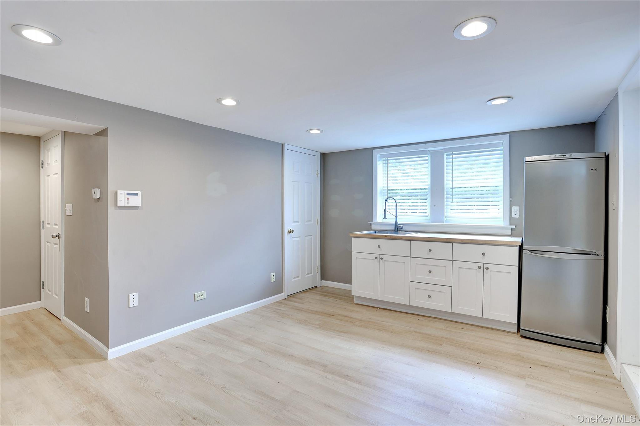 254 North Main Street New City, NY 10956 - Photo 20 of 37 a kitchen with a refrigerator and window