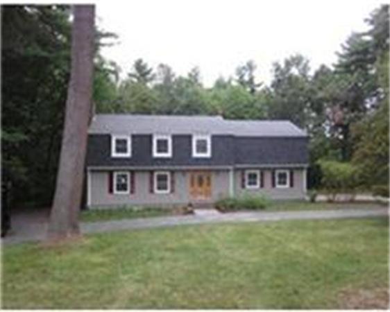 4 Scott Road Harvard, MA 01451 - Photo 1 of 12 a view of a big yard with a house