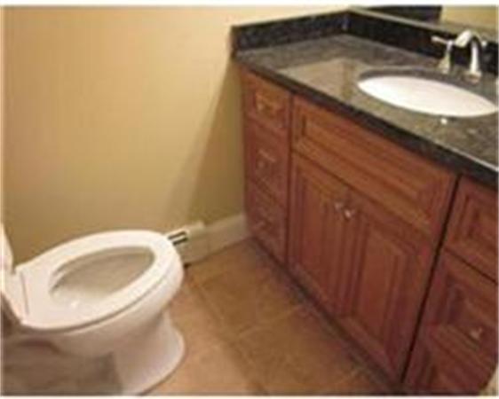 4 Scott Road Harvard, MA 01451 - Photo 10 of 12 a bathroom with a sink and a toilet