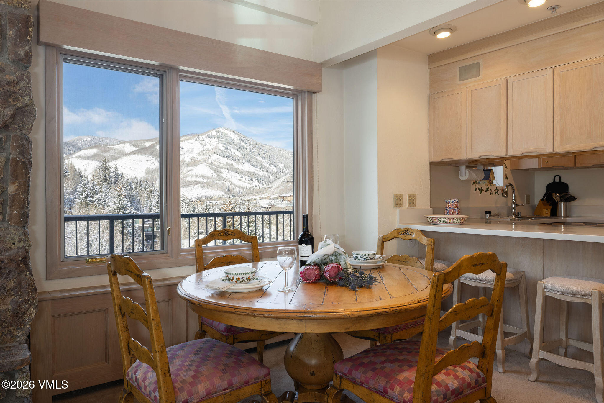 200 Vail Road, Unit 799 Vail, CO 81657 - Photo 7 of 32 a view of a dining room with furniture window and outside view