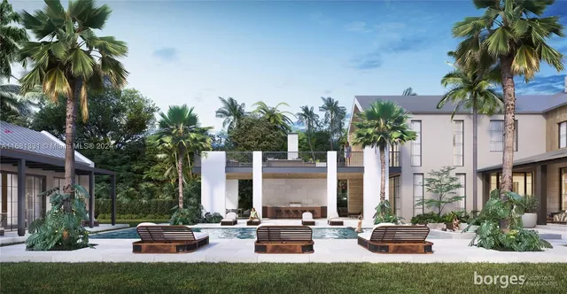 a view of a patio with couches and a fire pit