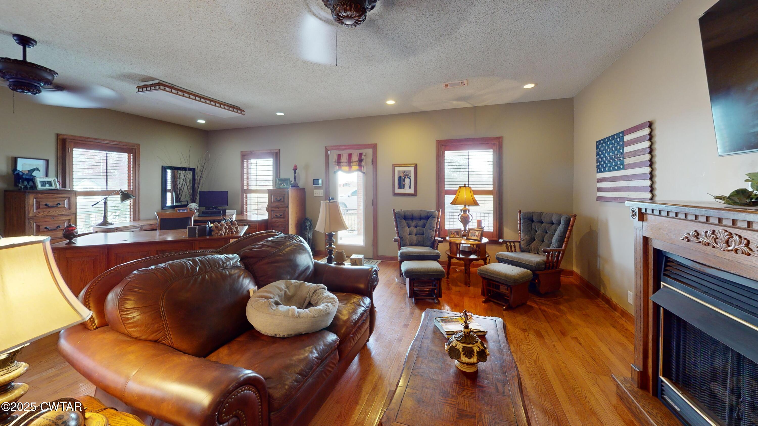 1268 Lightfoot Luckett Road Ripley, TN 38063 - Photo 7 of 40 a living room with furniture and a fireplace