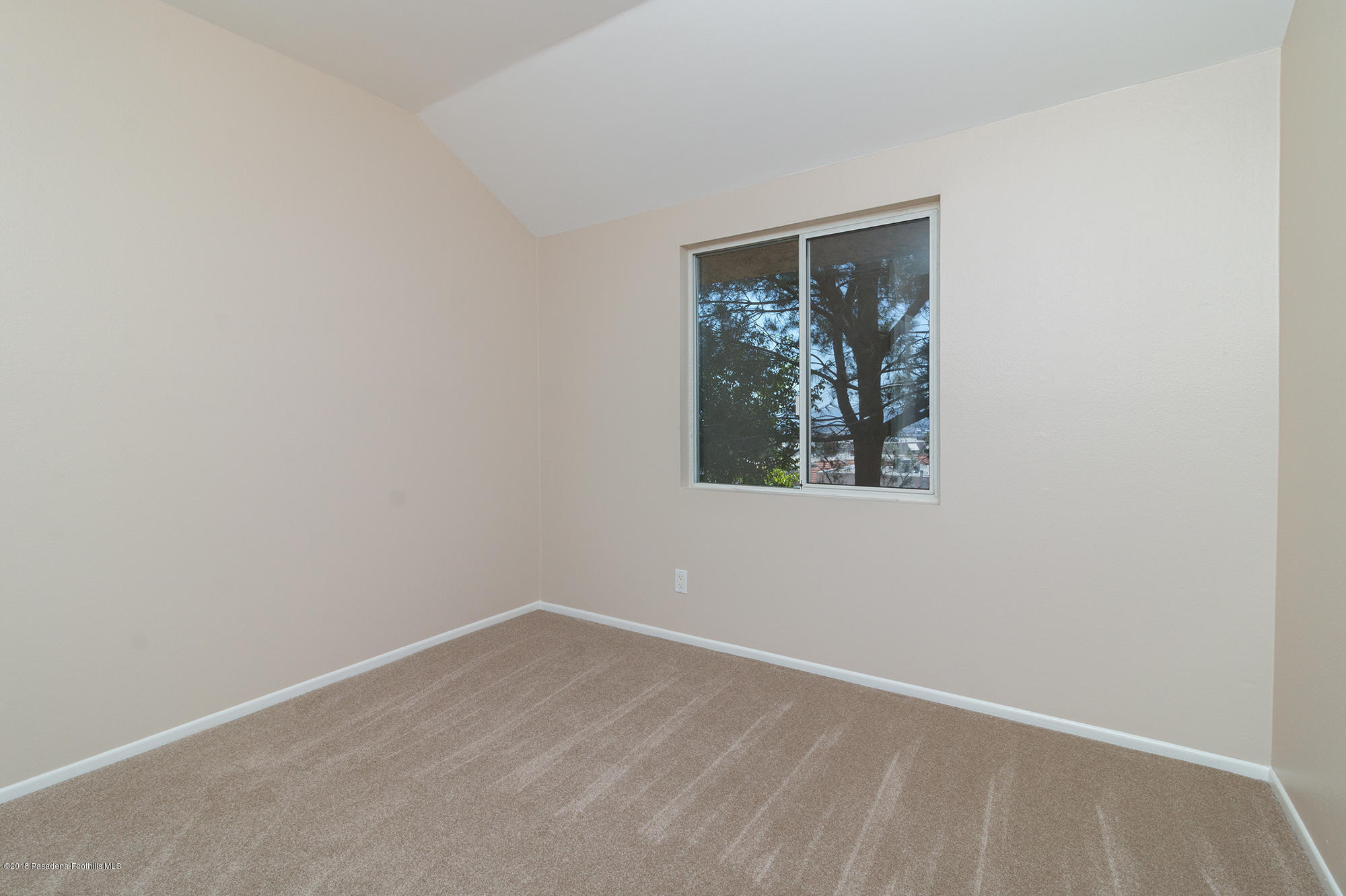9730 Vía Roma Burbank, CA 91504 - Photo 24 of 24 an empty room with a window