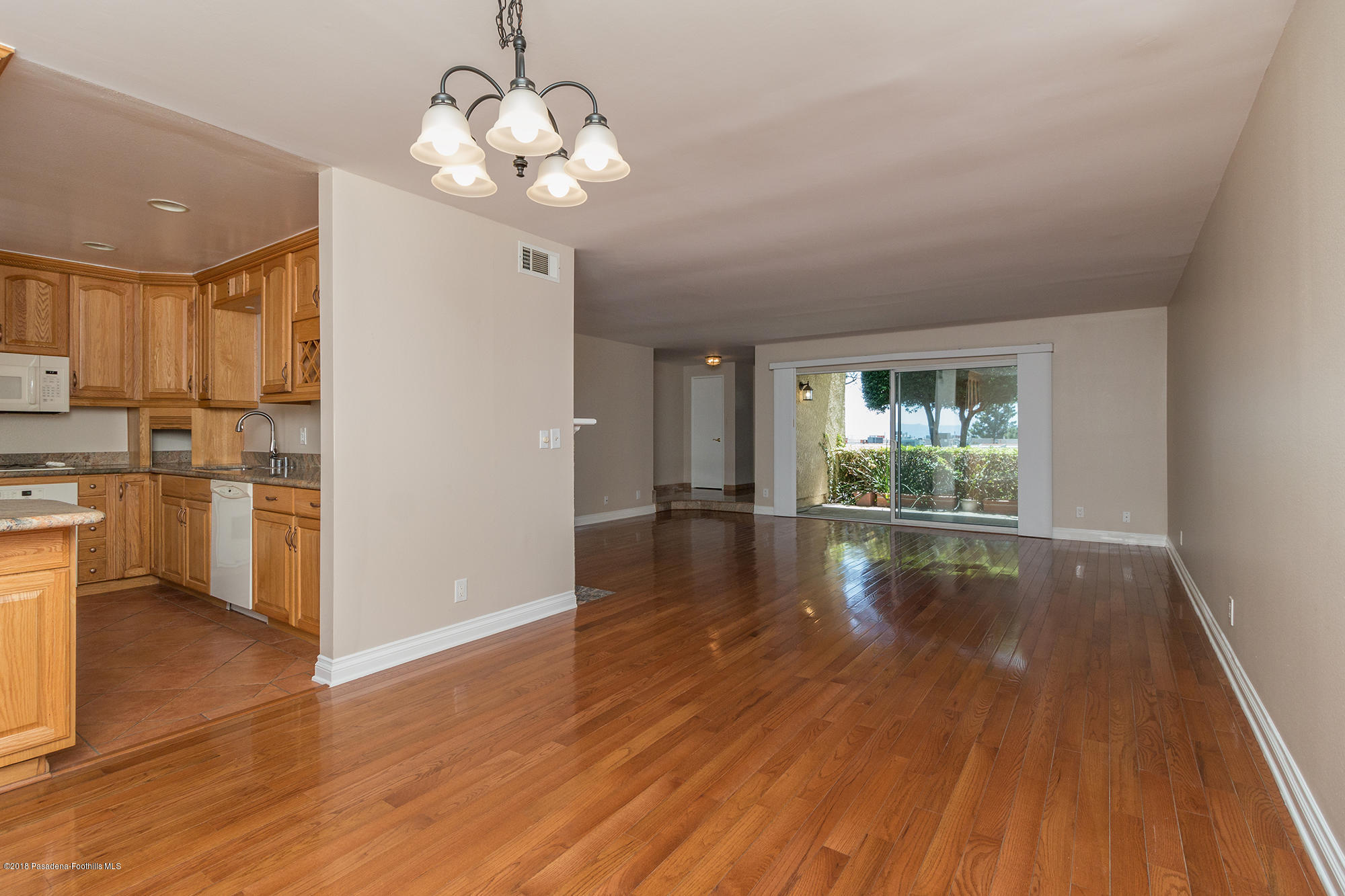 9730 Vía Roma Burbank, CA 91504 - Photo 6 of 24 a view of a livingroom with wooden floor
