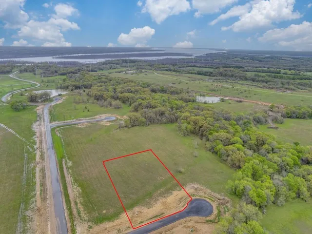 a view of a lake from a yard