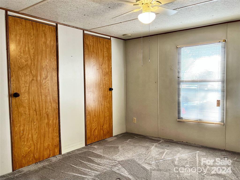 7001 Alexander Farm Road Monroe, NC 28110 - Photo 8 of 14 a view of an empty room with a window