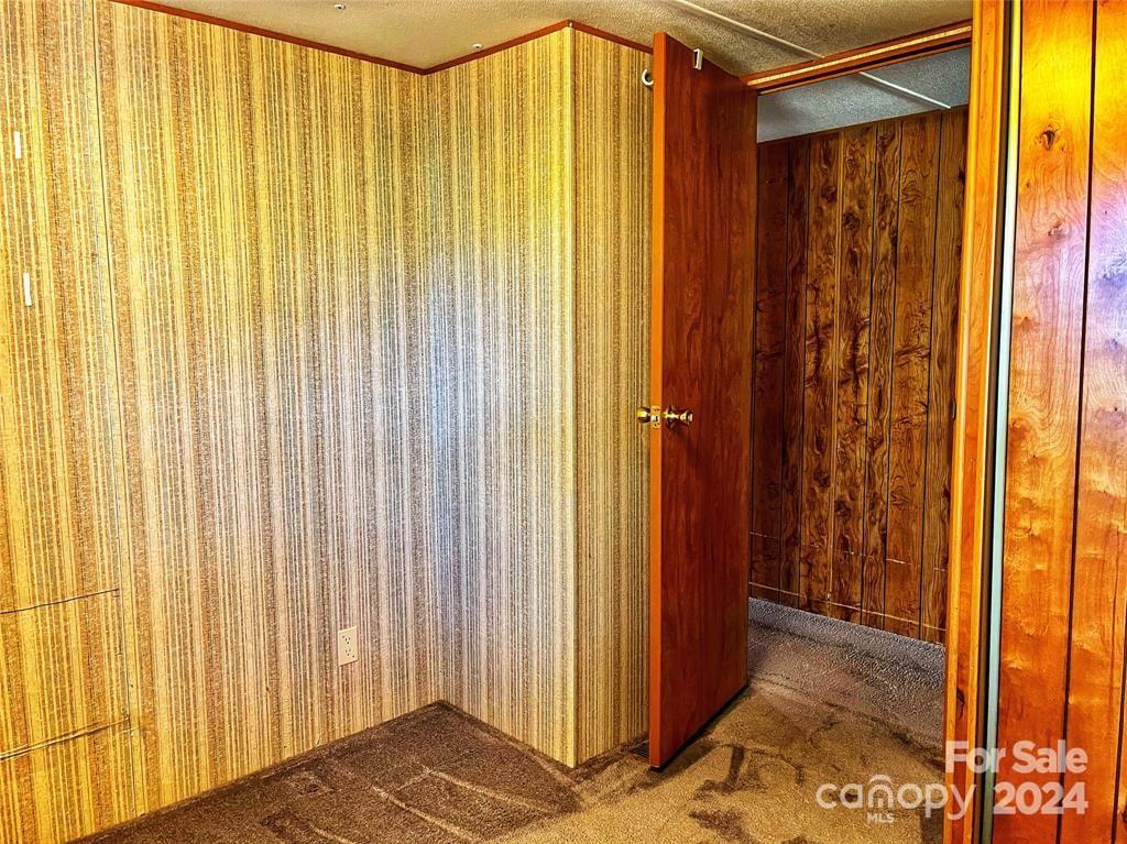 7001 Alexander Farm Road Monroe, NC 28110 - Photo 10 of 14 a view of a bathroom with a shower curtain