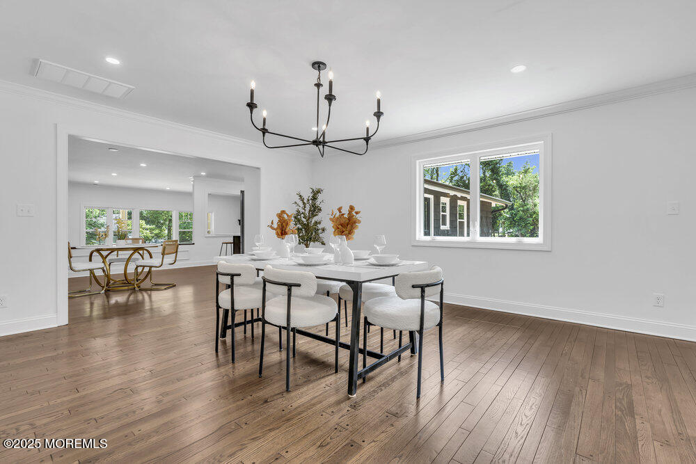 8 Holling Road Colts Neck, NJ 07722 - Photo 13 of 41 a view of a dining room with furniture window and wooden floor
