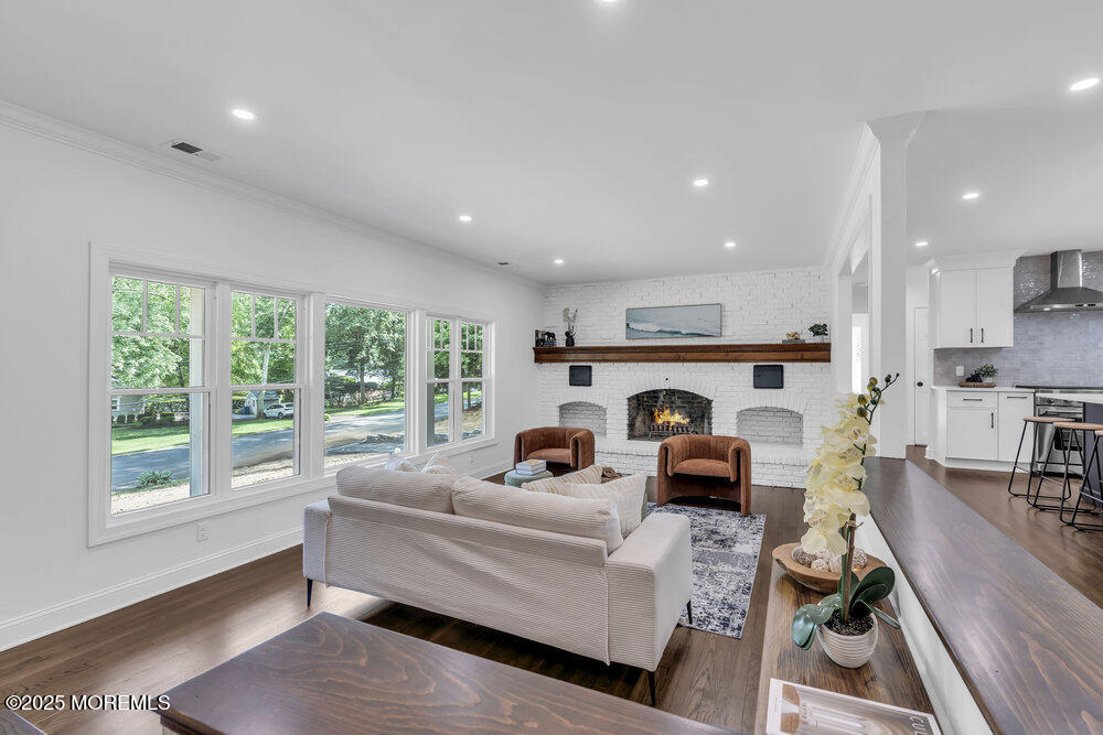 8 Holling Road Colts Neck, NJ 07722 - Photo 3 of 41 a living room with furniture and a table