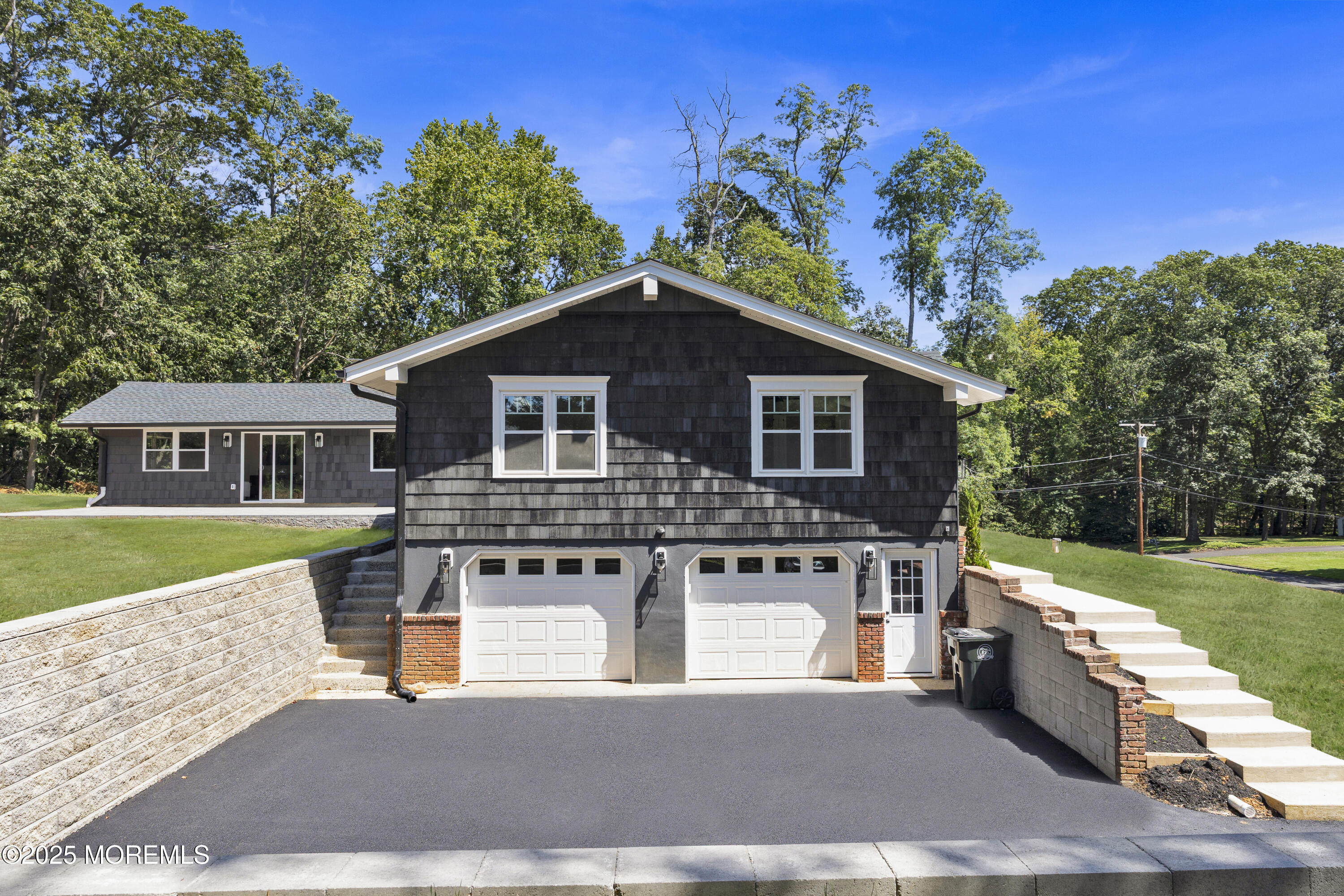 8 Holling Road Colts Neck, NJ 07722 - Photo 37 of 41 a front view of a house with a yard