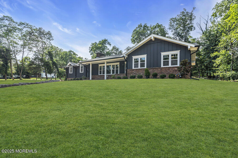 8 Holling Road Colts Neck, NJ 07722 - Photo 38 of 41 a view of a house with a yard