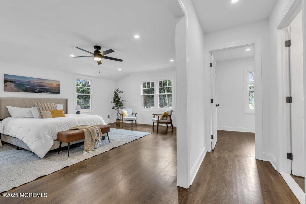 8 Holling Road Colts Neck, NJ 07722 - Photo 10 of 41 a living room with furniture and wooden floor