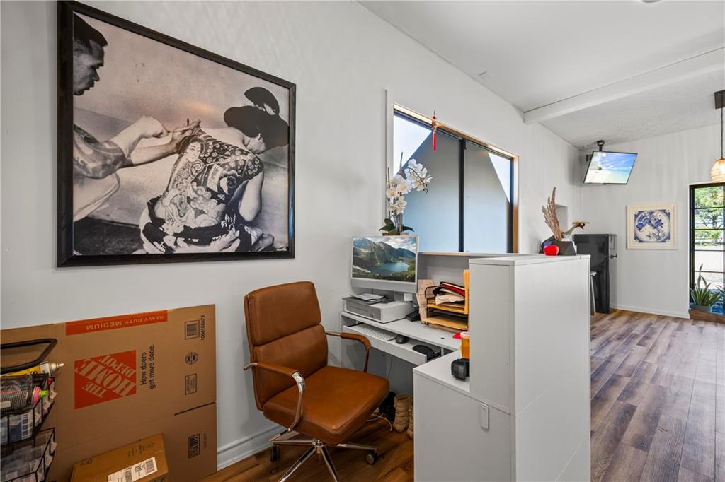 356 West Oak Grove Road Northwest Adairsville, GA 30103 - Photo 12 of 128 a workspace with furniture and wooden floor